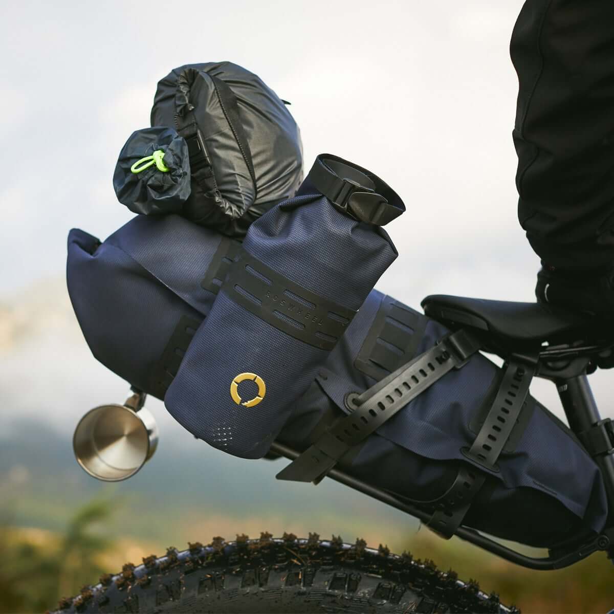 Off-Road Seat Pack Medium designed for weekend adventures, featuring waterproof construction, M.O.L.L.E. attachment system, and a stable adjustable rack for secure fitting.