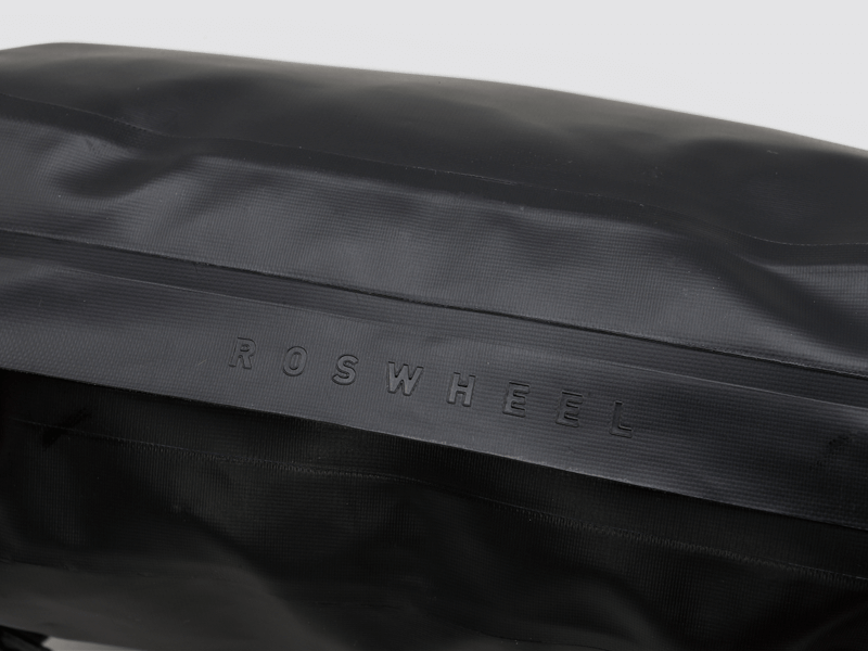 Road Accessory Pouch for easy access, featuring 'Fast-Fix' straps for secure attachment, large reflective area, and lightweight construction.
