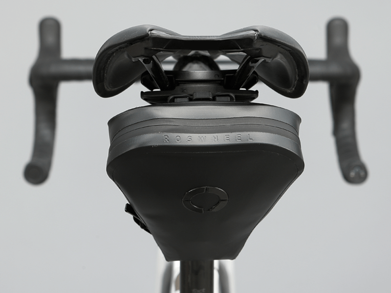 Road Saddle Bag - Large designed for easy access to spares and bulkier gear, featuring quick release buckle, 'Fast-Fix' strap system, lightweight construction, and reflective details for visibility.