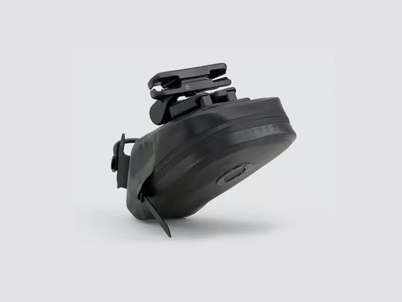 Road Saddle Bag - Small designed for easy access to spares and gear, featuring quick release buckle, 'Fast-Fix' strap system, and lightweight construction with reflective details.