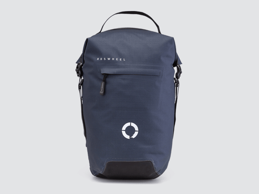 Waterproof Tour pannier bags (20L pair) with quick-tighten closure and reflective details for long-distance touring.