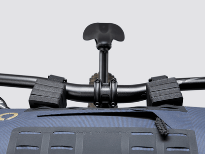 Off-Road Handlebar Bag Large designed for bulky gear, featuring extensive M.O.L.L.E. system, durable waterproof fabric, and internal pocket for secure organization.