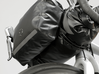 Road Accessory Pouch for easy access, featuring 'Fast-Fix' straps for secure attachment, large reflective area, and lightweight construction.