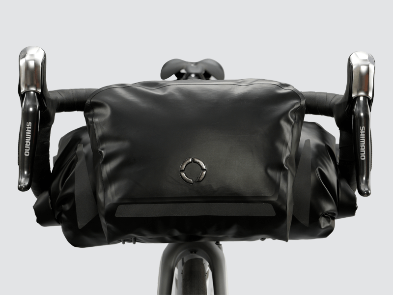 Road Accessory Pouch for easy access, featuring 'Fast-Fix' straps for secure attachment, large reflective area, and lightweight construction.