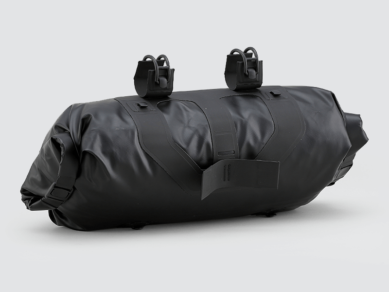 Road Handlebar Bag with 'Fast-Fix' straps, large reflective areas, and easy attachment for bulky items.