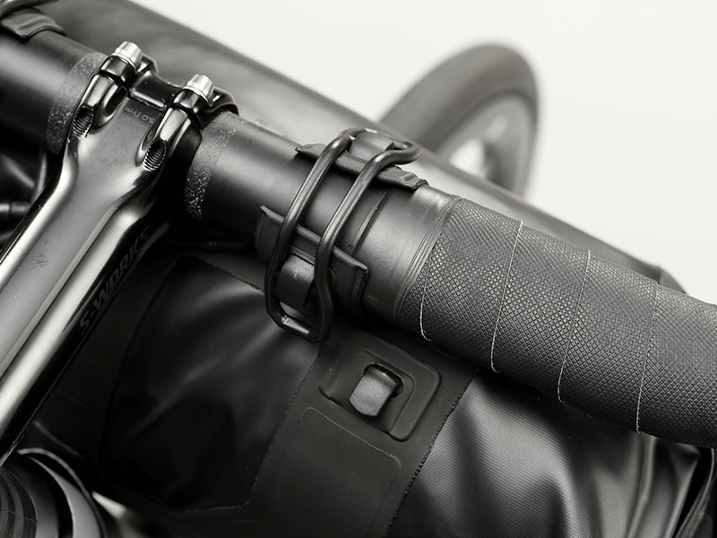 Road Handlebar Bag with 'Fast-Fix' straps, large reflective areas, and easy attachment for bulky items.