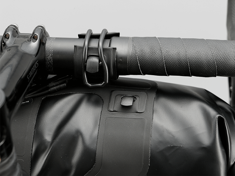 Road Handlebar Bag with 'Fast-Fix' straps, large reflective areas, and easy attachment for bulky items.