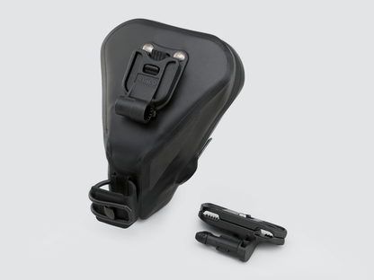 Road Saddle Bag - Small designed for easy access to spares and gear, featuring quick release buckle, 'Fast-Fix' strap system, and lightweight construction with reflective details.