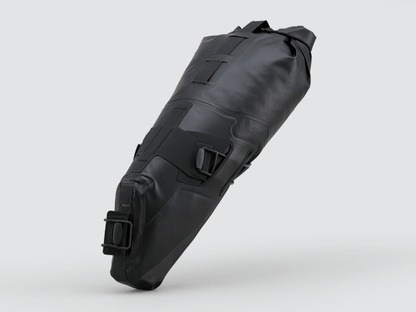 Road Seat Pack Medium designed for convenience and secure attachment, featuring 'Fast-Fix' strap system, lightweight construction, and large reflective areas for enhanced visibility.