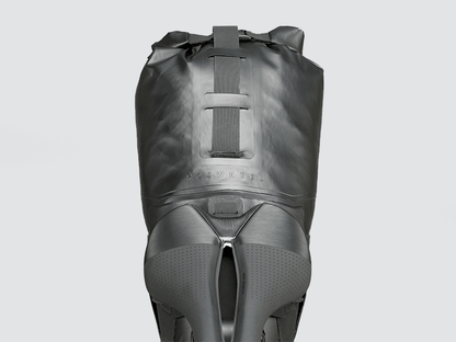 Road Seat Pack Medium designed for convenience and secure attachment, featuring 'Fast-Fix' strap system, lightweight construction, and large reflective areas for enhanced visibility.