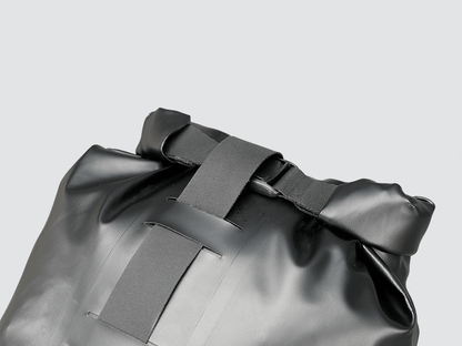 Road Seat Pack Medium designed for convenience and secure attachment, featuring 'Fast-Fix' strap system, lightweight construction, and large reflective areas for enhanced visibility.