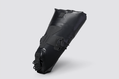 Road Seat Pack Small designed for fast rides, featuring 'Fast-Fix' strap system for secure attachment, lightweight construction, and large reflective areas for visibility.