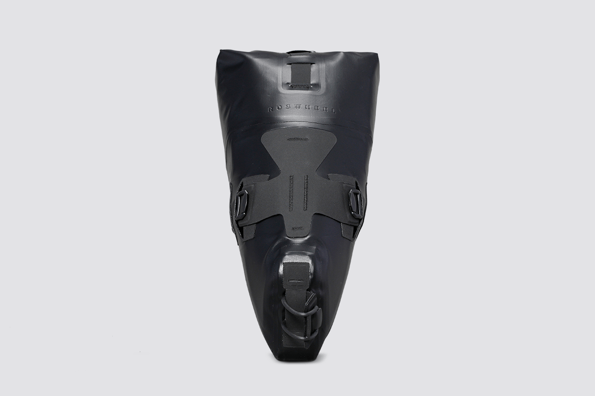 Road Seat Pack Small designed for fast rides, featuring 'Fast-Fix' strap system for secure attachment, lightweight construction, and large reflective areas for visibility.