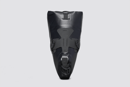 Road Seat Pack Small designed for fast rides, featuring 'Fast-Fix' strap system for secure attachment, lightweight construction, and large reflective areas for visibility.