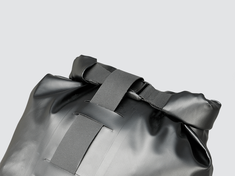 Road Seat Pack Small designed for fast rides, featuring 'Fast-Fix' strap system for secure attachment, lightweight construction, and large reflective areas for visibility.