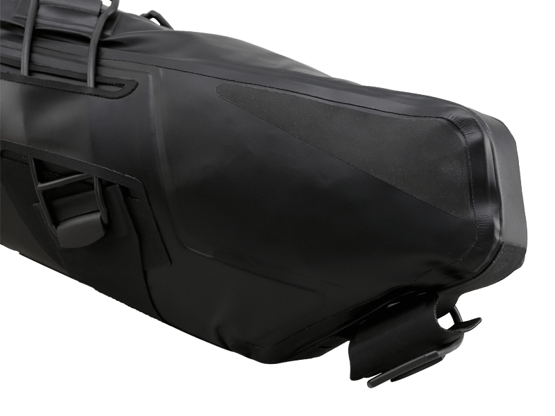 Road Seat Pack Small designed for fast rides, featuring 'Fast-Fix' strap system for secure attachment, lightweight construction, and large reflective areas for visibility.