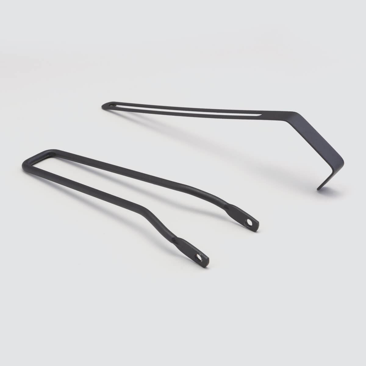 Tour Lightweight Rear Rack for touring and city use, compatible with pannier bags and disc brake bikes.