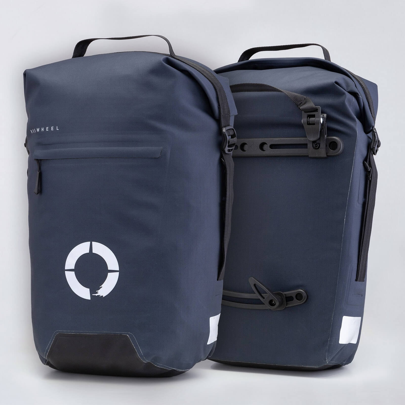 Waterproof Tour pannier bags (40L pair) with quick-tighten closure and reflective features for long-distance touring.