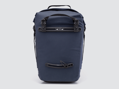 Waterproof Tour pannier bags (40L pair) with quick-tighten closure and reflective features for long-distance touring.