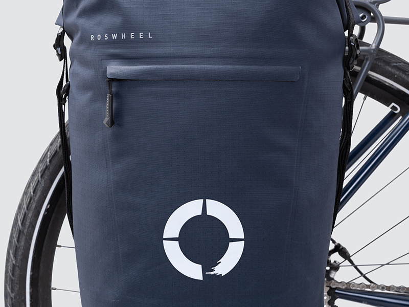 Waterproof Tour pannier bags (40L pair) with quick-tighten closure and reflective features for long-distance touring.