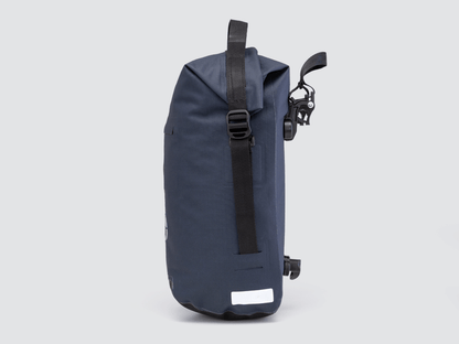 Waterproof Tour pannier bags (20L pair) with quick-tighten closure and reflective details for long-distance touring.