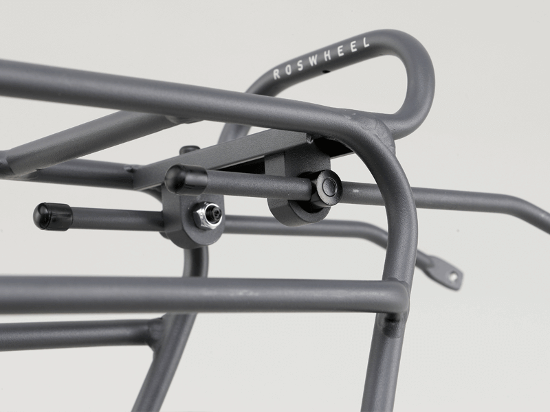 Tour rear rack for large loads, compatible with pannier bags and disc brake bikes, featuring dual-level design.