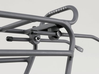 Tour rear rack for large loads, compatible with pannier bags and disc brake bikes, featuring dual-level design.