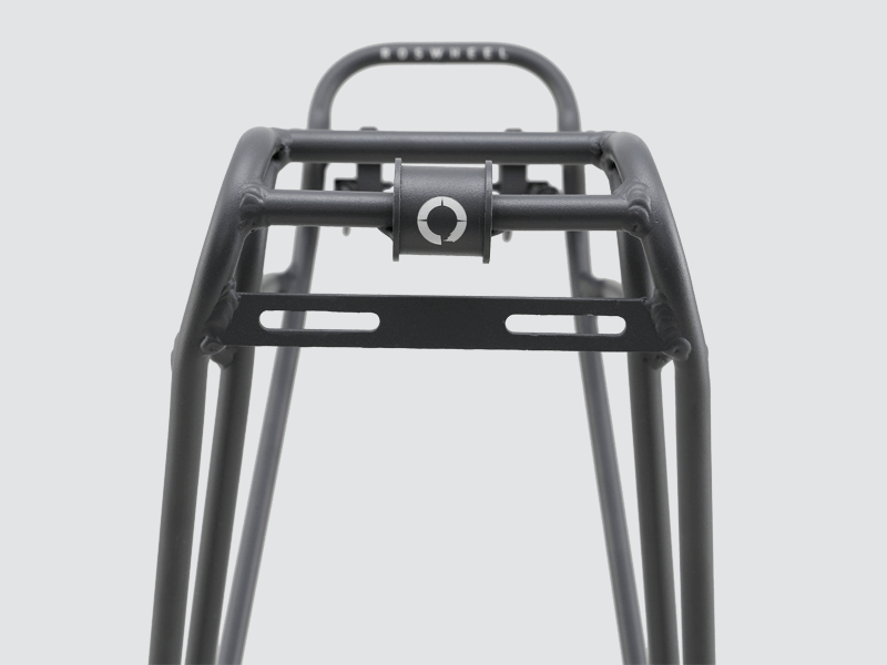 Tour rear rack for large loads, compatible with pannier bags and disc brake bikes, featuring dual-level design.