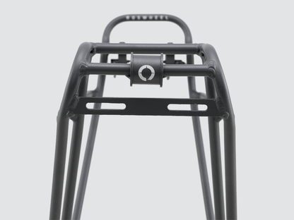 Tour rear rack for large loads, compatible with pannier bags and disc brake bikes, featuring dual-level design.