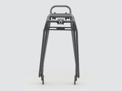 Tour rear rack for large loads, compatible with pannier bags and disc brake bikes, featuring dual-level design.