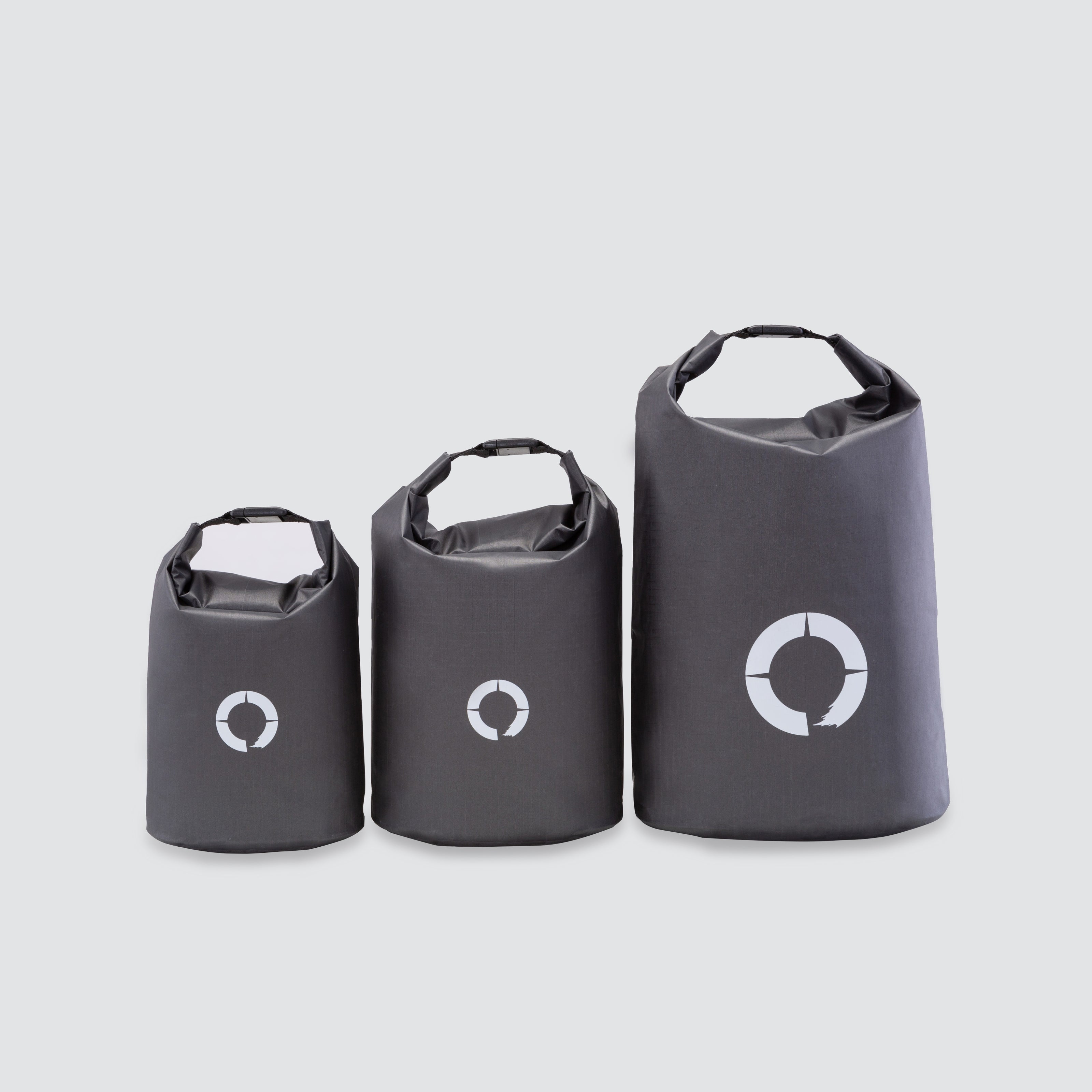Set of three waterproof roll top sacks (2L, 4L, 8L) for organizing gear, featuring lightweight and durable construction.