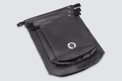 Set of three waterproof roll top sacks (2L, 4L, 8L) for organizing gear, featuring lightweight and durable construction.