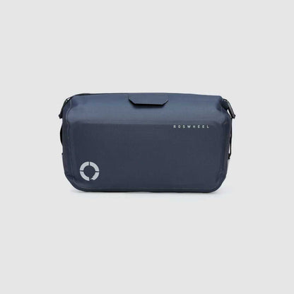 Waterproof Tour trunk bag with integrated attachment, reflective details, and protective base for secure storage.