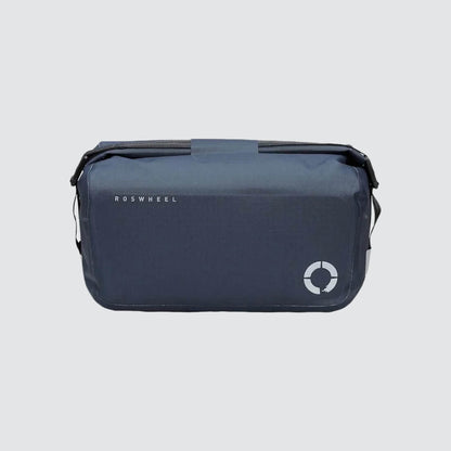 Waterproof Tour trunk bag with integrated attachment, reflective details, and protective base for secure storage.