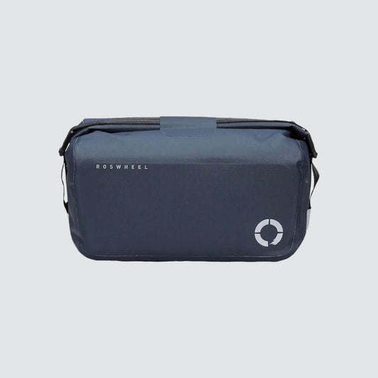 Waterproof Tour trunk bag with integrated attachment, reflective details, and protective base for secure storage.